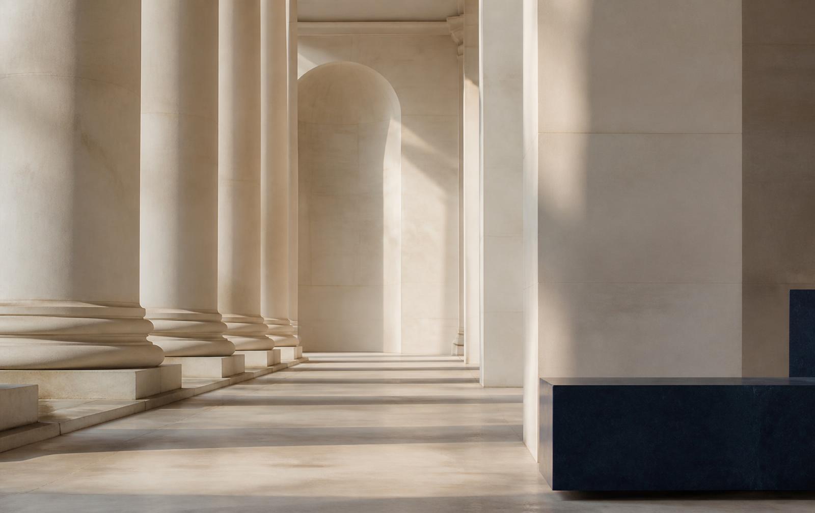 Calm ivory stone colonnade in morning light